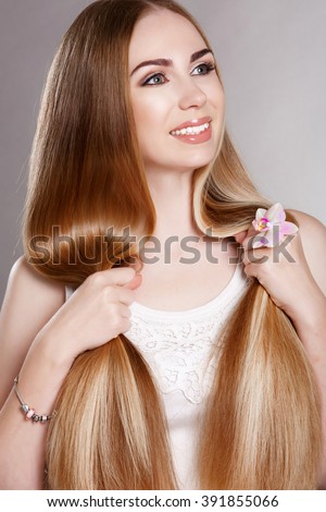 http://thumb9.shutterstock.com/display_pic_with_logo/2457938/391855066/stock-photo-hair-beauty-blonde-woman-portrait-model-with-long-healthy-straight-blond-hair-pretty-woman-with-391855066.jpg