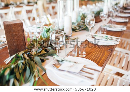 Rustic Wedding Decor Table Setting With Candles And Eucalyptus Rustic Wedding Decor Table Setting With Candles And Eucalyptus