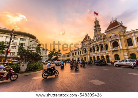 HO CHI MINH CITY,VIETNAM - DEC 10: Traffic in front of Ho Chi Minh City Hall at twilight on December 10,2015 in Ho Chi Minh City,Vietnam.