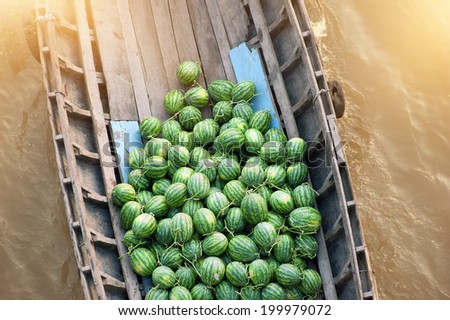 Vietnam, Mekong river delta. Boat on traditional floating market