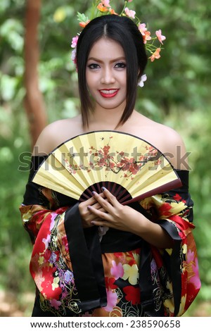 https://thumb9.shutterstock.com/display_pic_with_logo/2589682/238590658/stock-photo-portrait-asia-beautiful-japanese-kimono-women-and-japanese-geisha-women-with-folding-fan-and-238590658.jpg