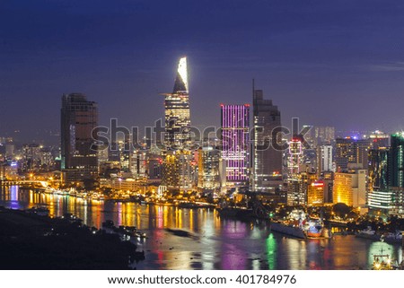 SAIGON, VIETNAM - DEC 20, 2014 : Impression landscape of Ho Chi Minh city at night , Saigon river flows through the city, this photo was taken at Sai Gon pearl building.