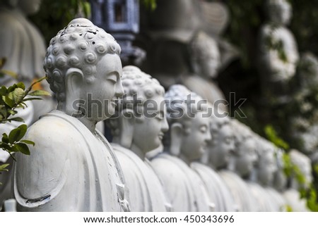 KIEN GIANG, VIETNAM - JULY 08, 2016 - The Buddha statues at the Cave Pagoda (Vietnamese is Chua Hang) at Kien Giang province, Vietnam
