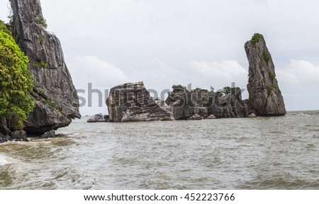KIEN GIANG, VIETNAM - JULY 08, 2016 - The Hon Phu Tu (Father-and-Son rock), a natural wonder near Chong Tourism Island in Kien Giang province's Kien Luong district