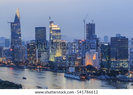 SAIGON, VIETNAM - DEC 23, 2016 : Impression landscape of Ho Chi Minh city at night , Saigon river flows through the city, this photo was taken at Sai Gon pearl building.