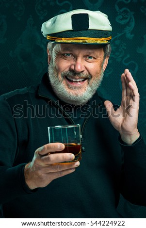 stock-photo-portrait-of-old-captain-or-sailor-man-in-black-sweater-544224922.jpg