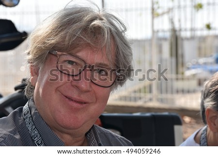Marseille, France - October 06, 2016 : French cartoonist Jean-Michel Renault at the 5th edition of the International festival of press and political cartoons at l'Estaque.