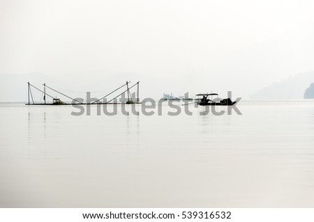 sunrise on thung nai lake , hoa binh , viet nam