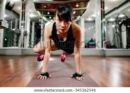 https://thumb9.shutterstock.com/display_pic_with_logo/2692042/345362546/stock-photo-asian-fitness-girl-instructor-stretching-and-shaping-in-gym-345362546.jpg