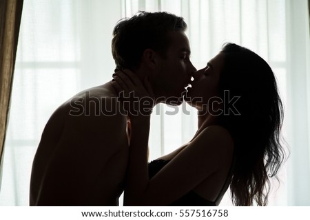 stock-photo-side-view-of-kissing-couple-lady-touching-man-s-neck-nobody-can-separate-us-557516758.jpg