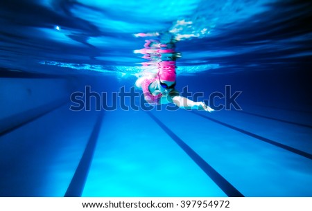 Olympic Swimming Pool Underwater woman swimming freestyle under water shoot stock photo 397954972 Olympic Swimming Pool Underwater woman swimming freestyle under water shoot stock photo 397954972