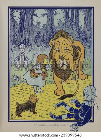 Wonderful Wizard of Oz main characters, created by Frank Lyman Baum in 1900. Dorothy speaks to the Cowardly Lion.