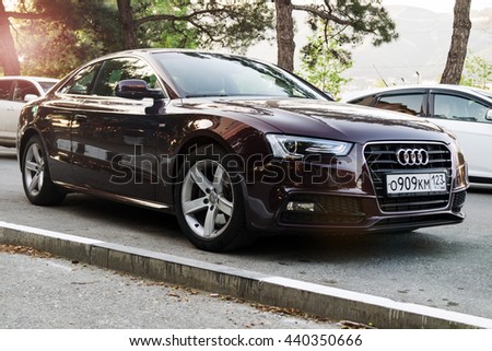 Audi A5 in sunlight Munich, GERMANY - APRIL 29, 2016: A Audi A5 parked on the streets of Munich. Audi is among the best-selling luxury automobiles in the world.