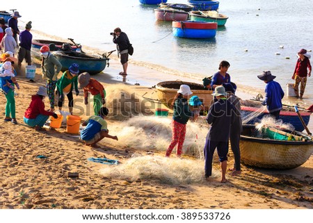 Ninh Thuan Province, Vietnam - February 27, 2016 : Fiish market on the beach. Sales fresh fish caught in the sea of new fishermen Ninh Thuan, Vietnam