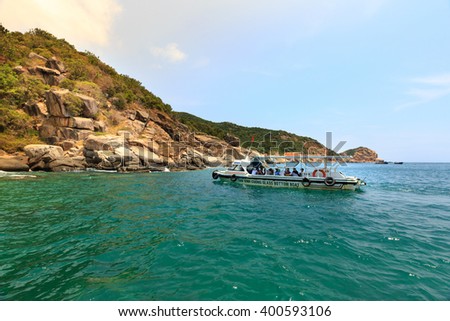 Hang Rai beach, Ninh Thuan province, Vietnam - March 27, 2016: Tourist boat at Vietnamese beach, Ecotourism at Hang Rai Vietnam, Phan Rang city, Ninh Thuan, coastal countryside, amazing ancient coral