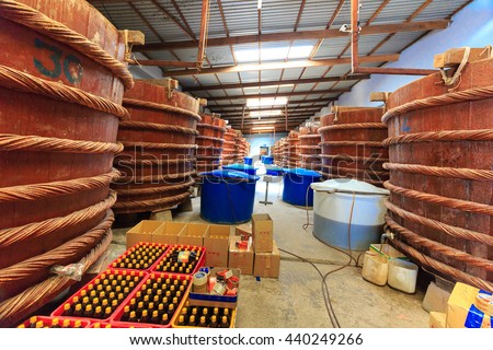 Phu Quoc island, Kien Giang province, Vietnam - May 02, 2016 : at factory fish sauce production facilities on Phu Quoc island by traditional fermented method of anchovies fermented brewed in large