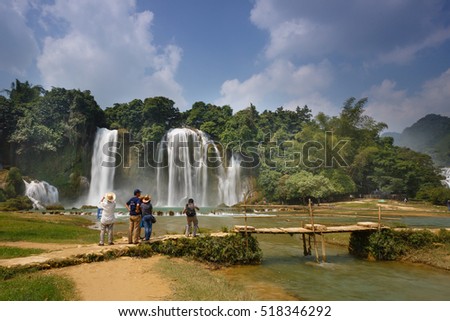 Ban Gioc waterfall, Cao Bang province, Vietnam - September 23, 2016 : tourists on boat at Ban Gioc waterfall in Cao Bang, Viet Nam. These are one of the nicest waterfalls in northern Vietnam.