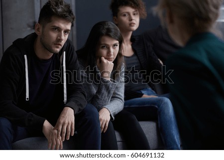 Young people addicted to drugs participating in group therapy