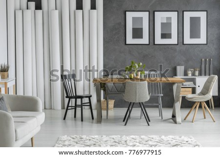Dining Table And Chairs In Monochromatic Living Room With Paper Tubes Decoration Posters On Textured Decorating Furniture L decorating furniture with paper. Dining Table And Chairs In Monochromatic Living Room With Paper Tubes Decoration Posters On Textured Decorating Furniture L