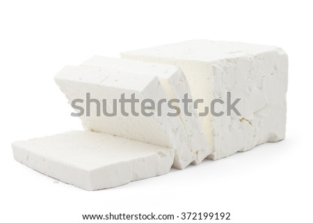 Sliced fresh white cheese from cow's milk on white background