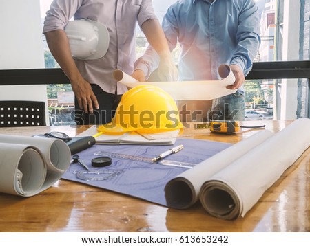 Architect discuss with engineer about project in office, architectural concept