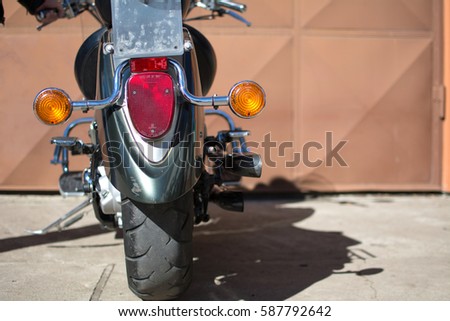 Subotica, Serbia-February 25,2017:Green Yamaha DragStar 1100 motorcycle in front of the garage, photographed on a nice sunny day. Ready for restoration. Lot of chrome detail.