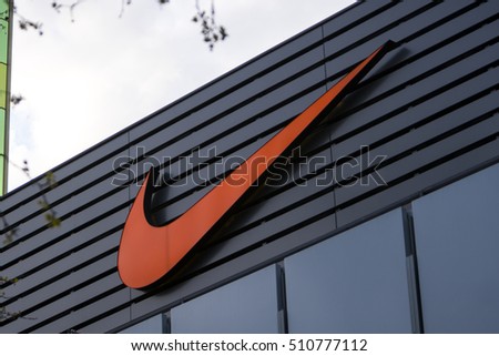 Berlin, Germany - April 26, 2016: Nike logo outside a store. Nike is a global sports clothes and running shoes retailer. Nike stores are located all over the world