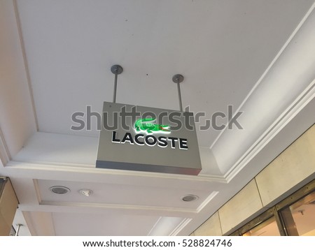 Berlin, Germany - December 3, 2016: Lacoste store. It is a French clothing company. Founded in 1933, it sells high-end clothing, footwear, perfume, watches, eyewear and most famously polo shirts
