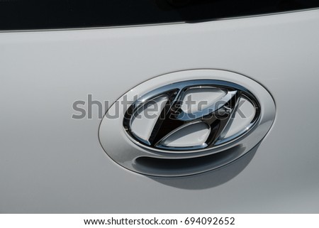 Rome, Italy - August 9, 2017: Hyundai logo on white car. The Hyundai Motor Company is a South Korean multinational automotive manufacturer