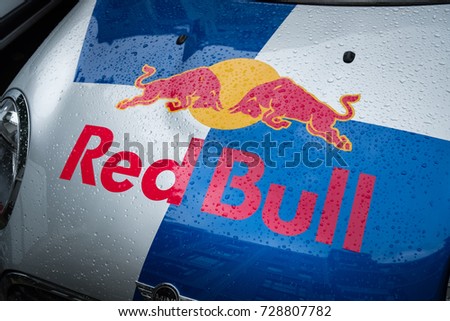 Berlin, Germany - July 10, 2017: Red Bull logo. Red Bull is an energy drink sold by Austrian company Red Bull GmbH, created in 1987. It has the highest market share of any energy drink in the world