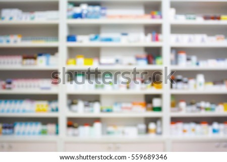 blur shelves of drugs in the pharmacy shop