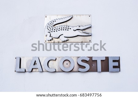 AYIA NAPA, CYPRUS - FEBRUARY 19, 2017: The logo of the brand Lacoste