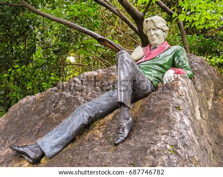 DUBLIN, IRELAND - NOVEMBER 06, 2013: Sculptures at Merrion Square, near House of Oscar Wilde in Dublin, Ireland