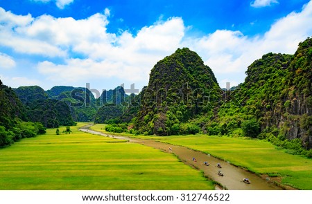 Rice field and river "Ngo Dong" at TamCoc, Ninhbinh, Vietnam; famous for tourism at Vietnam. Ninhbinh city is located in the south than the capital Hanoi, Vietnam.