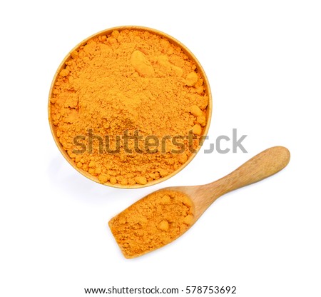 top view of turmeric powder in wooden bowl and spoon isolated on white background