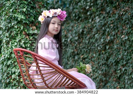 https://thumb9.shutterstock.com/display_pic_with_logo/3116558/384904822/stock-photo-fairy-portrait-of-beautiful-asian-teen-girl-with-flower-wreath-384904822.jpg