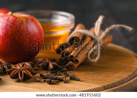 Baking concept background. Baking pastry and cookies: apples, spices, honney on wood