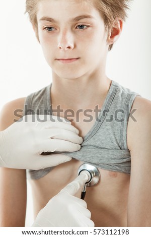 crop view young boy shirt lifted stock photo royalty free