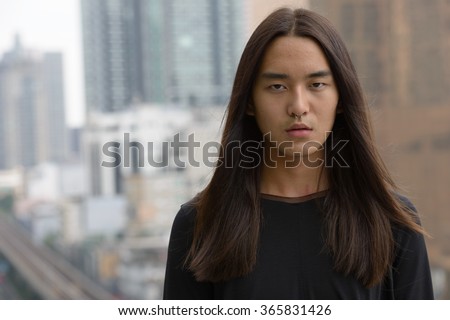 Long Hair Man Stock Images, Royalty-Free Images & Vectors 