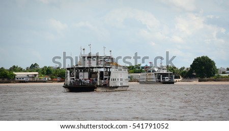 An Giang, Vietnam - Aug 7, 2016. A ferry on the Mekong River in Southern Vietnam. The Mekong is the world's 12th-longest river and the 7th-longest in Asia.