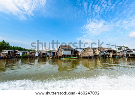 CaMau, VietNam: july, 05, 2016: Waterway at Mekong Delta, fe on Nam Can river, poor residential with house make from metal sheet among mangrove forest, Camau, Vietnam