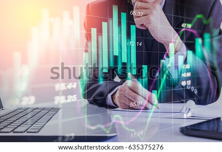 Double exposure businessman and stock market or forex graph suitable for financial investment concept. Economy trends background for business idea and all art work design. Abstract finance background.