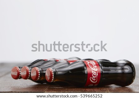 Kuala Lumpur, Malaysia 12th December 2016,coca cola soft drink on wooden table top