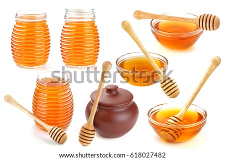 Isolated honey. Glass bowl, pot and honey stick isolated on white background with clipping path