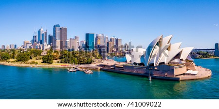 Amazing aerial footage view of the Sydney city from above with Harbour bridge, Opera house ant the harbour. April 10, 2016. Sydney, Australia. 