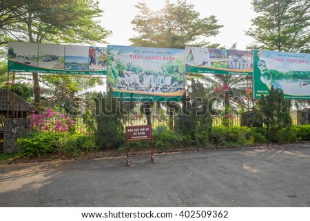 DONG NAI, VIETNAM March 16 2016: Advertiser and Parking sign at GiangDien Waterfall, Dong Nai province, Vietnam in a daytime