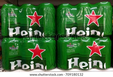 PENANG, MALAYSIA - AUGUST 24, 2017 : Heineken beer cans on store shelf. Heineken is a Dutch brewing company, founded in 1864 by Gerard Adriaan Heineken in Amsterdam.