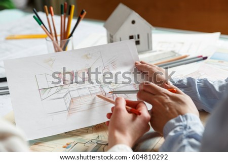 Interior Designers At Work interior designer works on hand drawing stock photo 135392435 Interior Designers At Work interior designer works on hand drawing stock photo 135392435