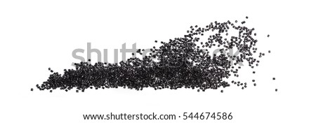 black plastic granules composition on white background