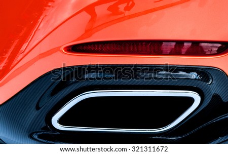 stock-photo-new-generation-of-sportive-mufflers-rectangular-car-exhaust-tail-close-up-of-a-car-dual-exhaust-321311672.jpg